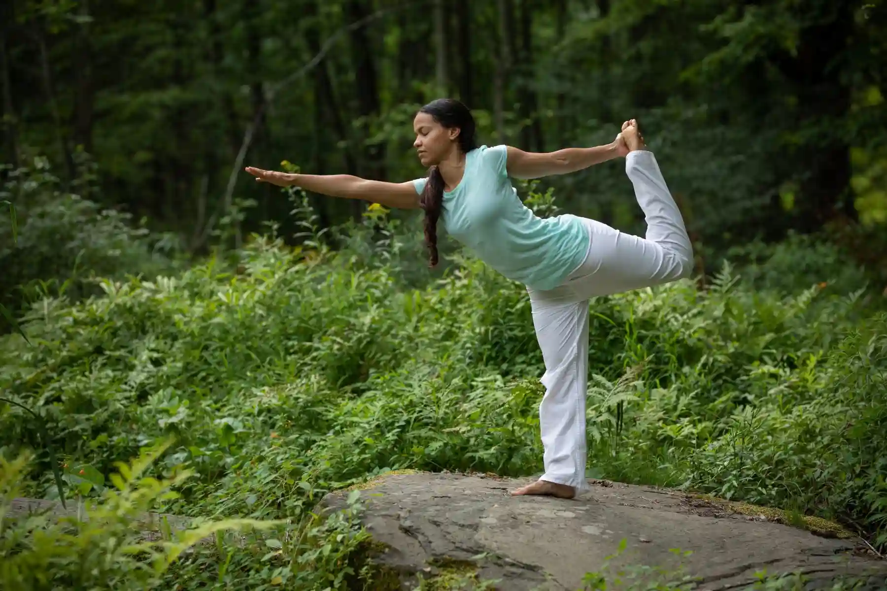Yoga in the forest at sunrise